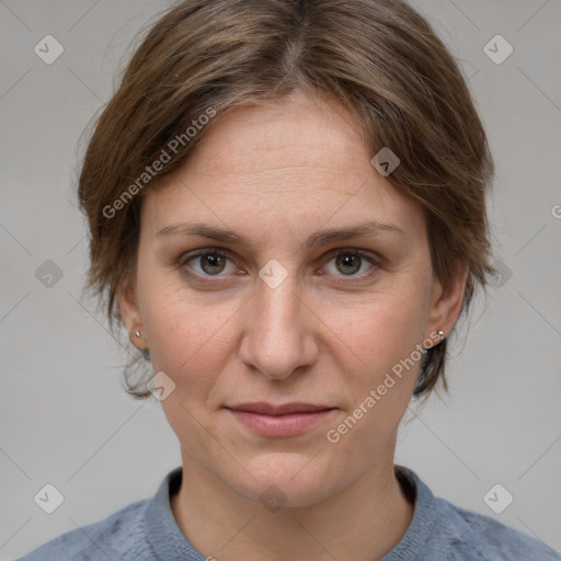 Joyful white adult female with medium  brown hair and grey eyes