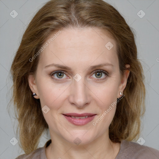 Joyful white young-adult female with medium  brown hair and blue eyes