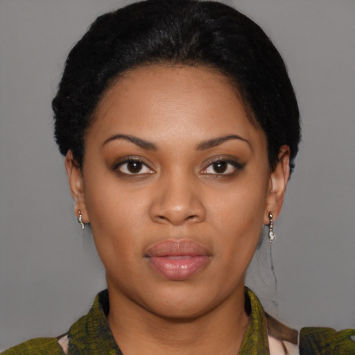 Joyful asian young-adult female with medium  black hair and brown eyes