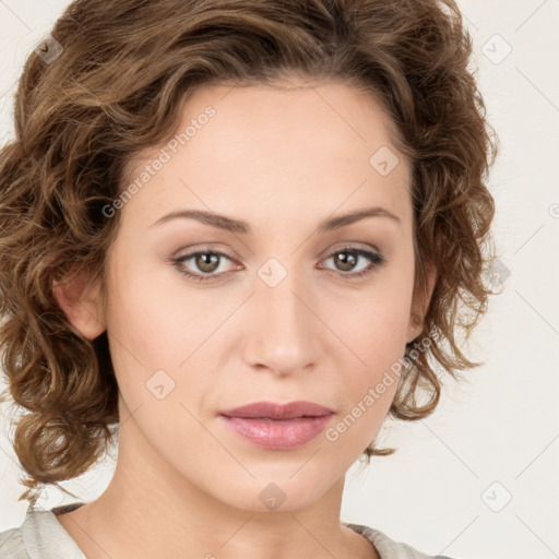 Joyful white young-adult female with medium  brown hair and green eyes