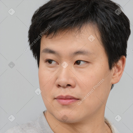 Neutral asian young-adult male with short  brown hair and brown eyes