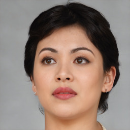 Neutral asian young-adult female with medium  black hair and brown eyes