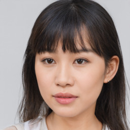 Neutral asian young-adult female with medium  brown hair and brown eyes