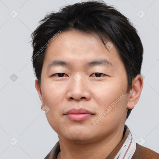 Neutral asian young-adult male with short  brown hair and brown eyes