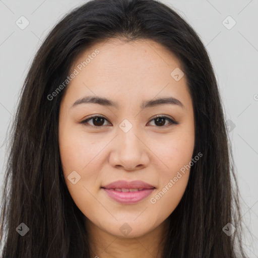 Joyful asian young-adult female with long  brown hair and brown eyes