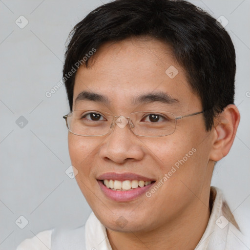 Joyful asian young-adult female with short  brown hair and brown eyes