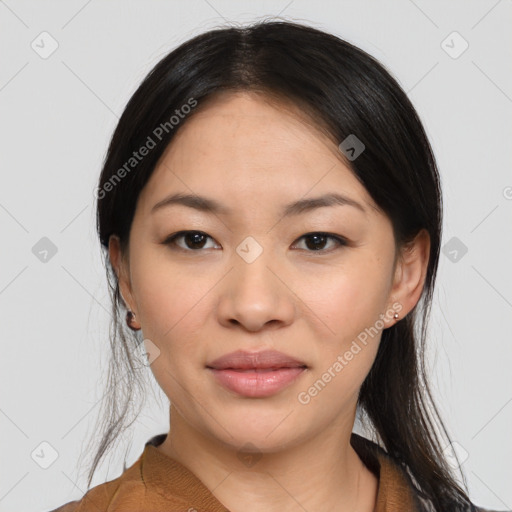 Joyful asian young-adult female with medium  black hair and brown eyes