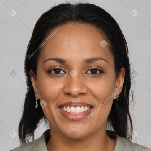 Joyful latino young-adult female with medium  brown hair and brown eyes