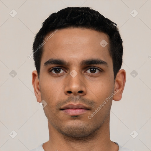 Neutral latino young-adult male with short  black hair and brown eyes