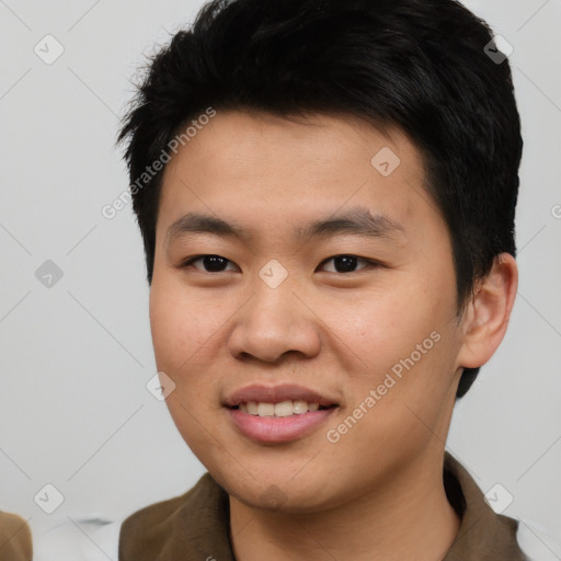 Joyful asian young-adult male with short  black hair and brown eyes