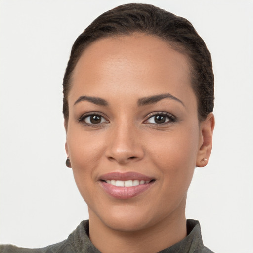 Joyful white young-adult female with short  brown hair and brown eyes