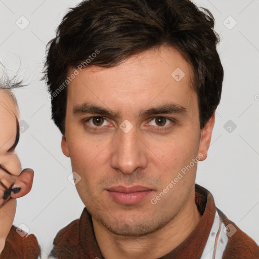 Neutral white young-adult male with short  brown hair and brown eyes