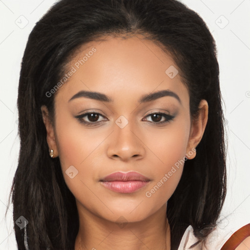 Joyful latino young-adult female with long  brown hair and brown eyes