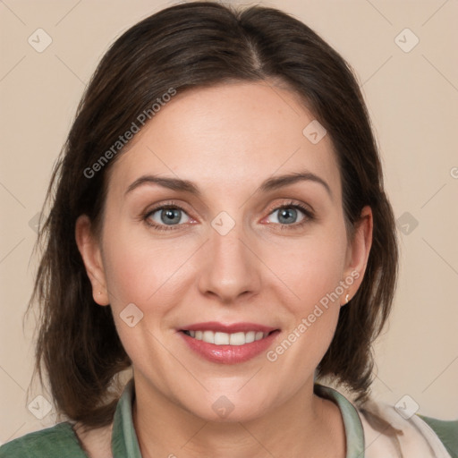 Joyful white young-adult female with medium  brown hair and grey eyes