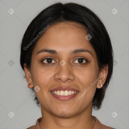 Joyful latino young-adult female with medium  brown hair and brown eyes