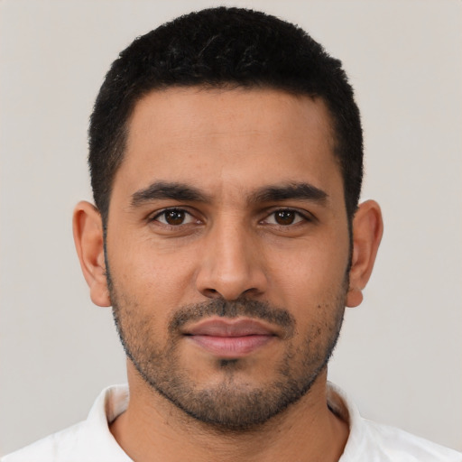Neutral latino young-adult male with short  black hair and brown eyes