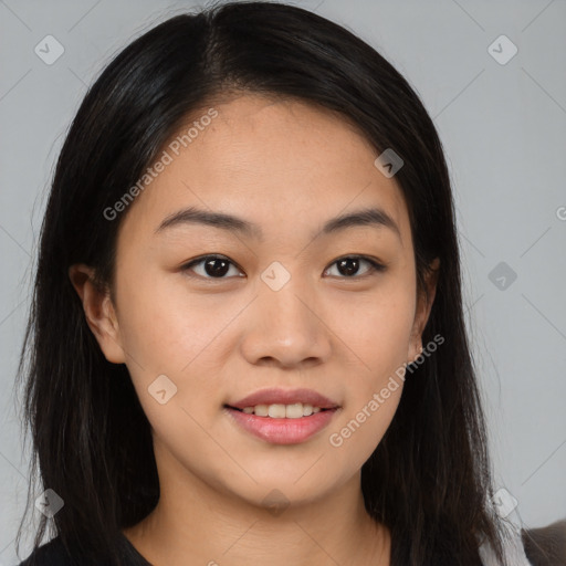 Joyful asian young-adult female with long  brown hair and brown eyes