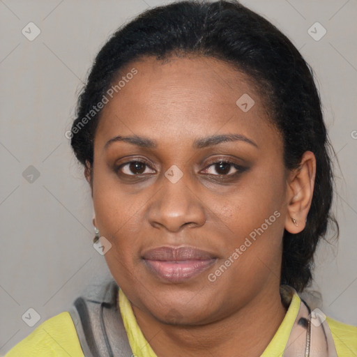 Joyful latino adult female with medium  brown hair and brown eyes