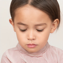 Neutral white child female with short  brown hair and brown eyes