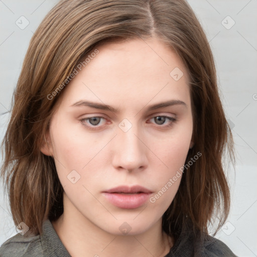 Neutral white young-adult female with medium  brown hair and grey eyes