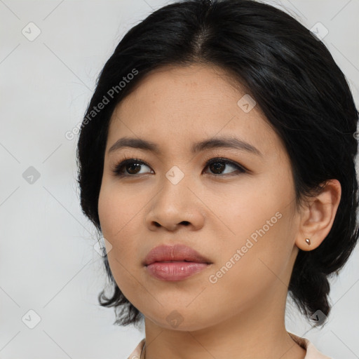 Neutral asian young-adult female with medium  black hair and brown eyes