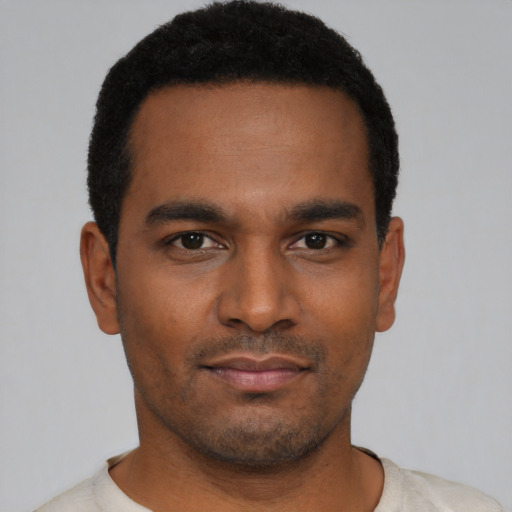 Neutral black young-adult male with short  black hair and brown eyes
