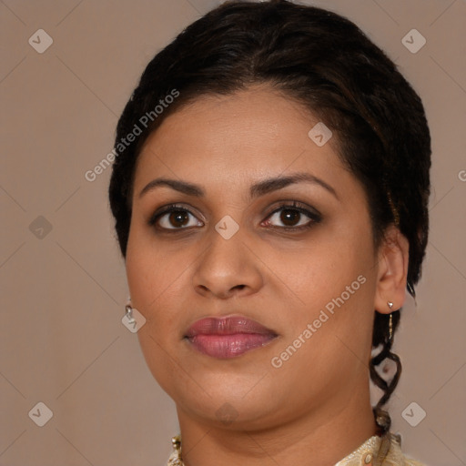 Joyful latino young-adult female with short  brown hair and brown eyes