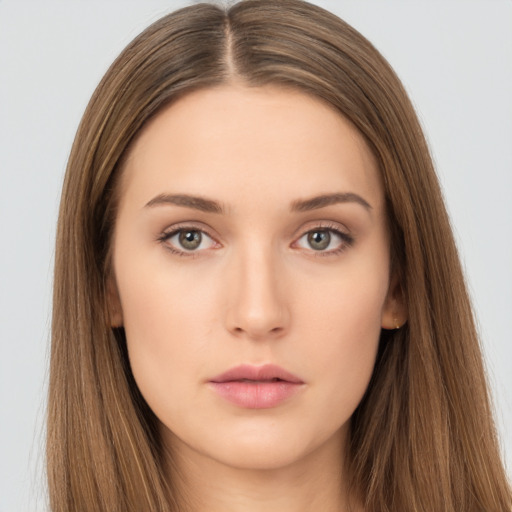 Neutral white young-adult female with long  brown hair and brown eyes