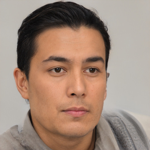 Neutral asian young-adult male with short  brown hair and brown eyes
