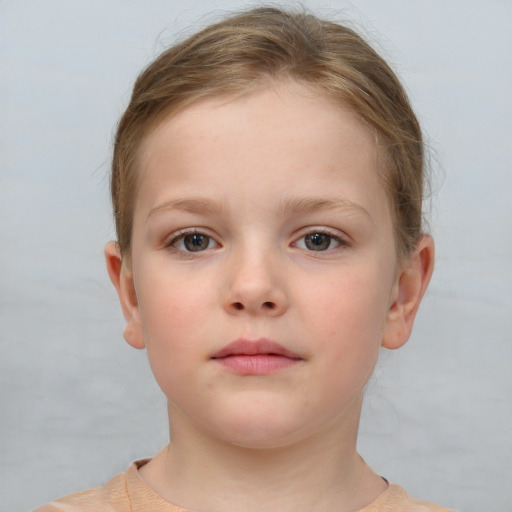 Neutral white child female with short  brown hair and brown eyes