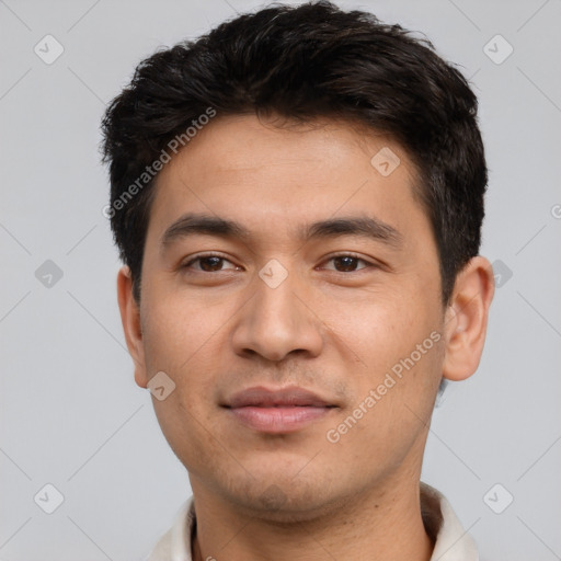 Joyful white young-adult male with short  black hair and brown eyes