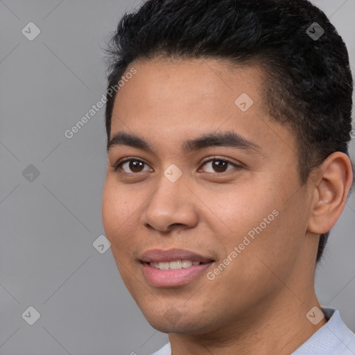 Joyful white young-adult male with short  black hair and brown eyes