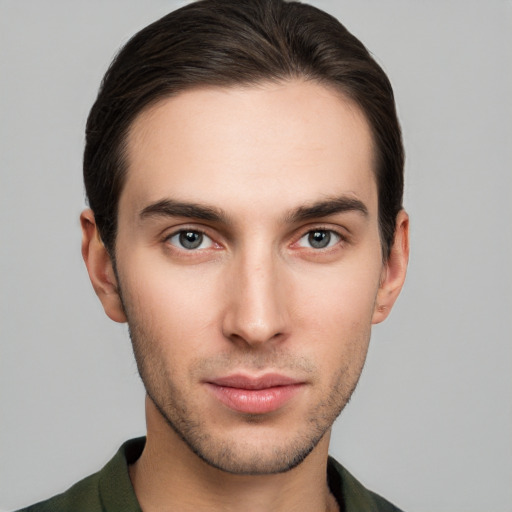 Neutral white young-adult male with short  brown hair and brown eyes