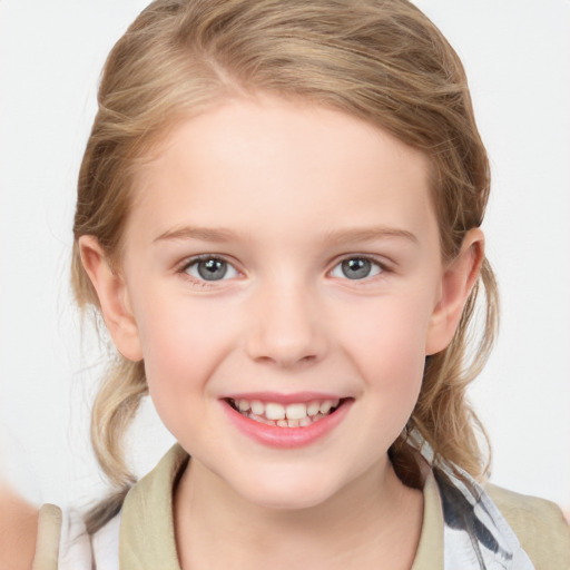 Joyful white child female with medium  brown hair and blue eyes