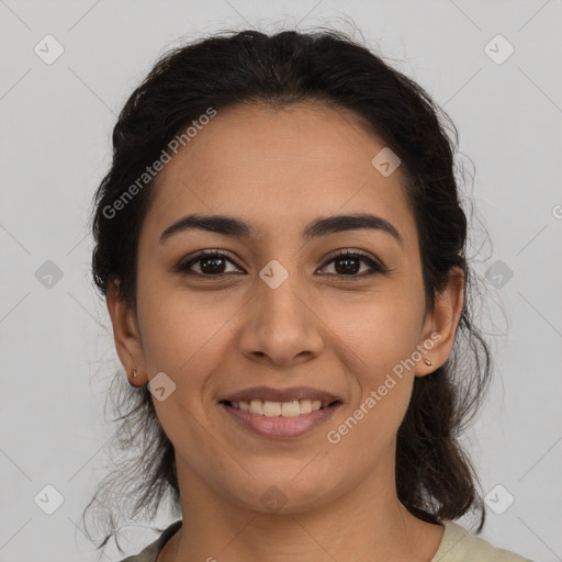 Joyful latino young-adult female with medium  brown hair and brown eyes