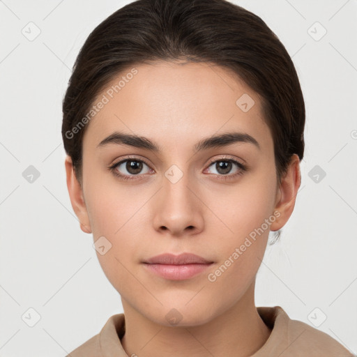 Neutral white young-adult female with short  brown hair and brown eyes