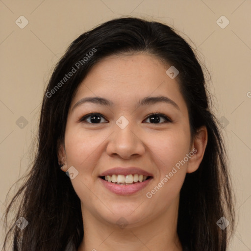 Joyful latino young-adult female with long  brown hair and brown eyes