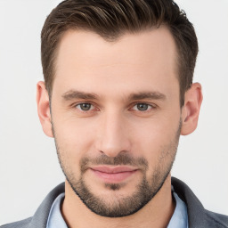 Joyful white young-adult male with short  brown hair and brown eyes