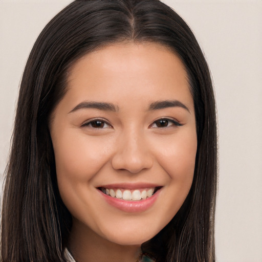 Joyful white young-adult female with long  brown hair and brown eyes