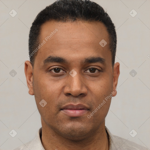 Neutral latino young-adult male with short  black hair and brown eyes