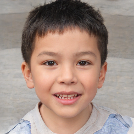 Joyful white child male with short  brown hair and brown eyes