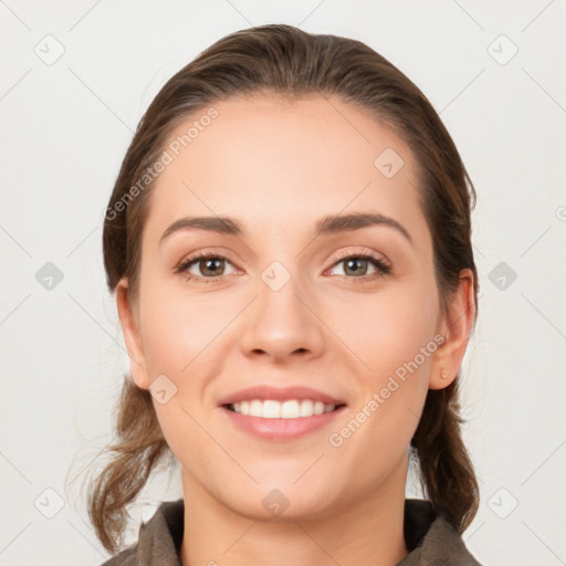 Joyful white young-adult female with medium  brown hair and grey eyes