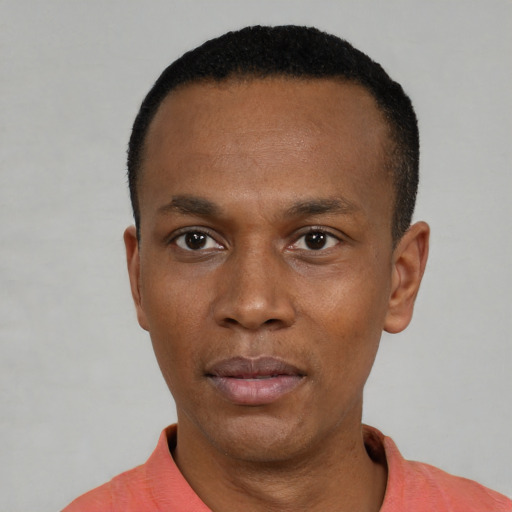 Neutral black young-adult male with short  black hair and brown eyes