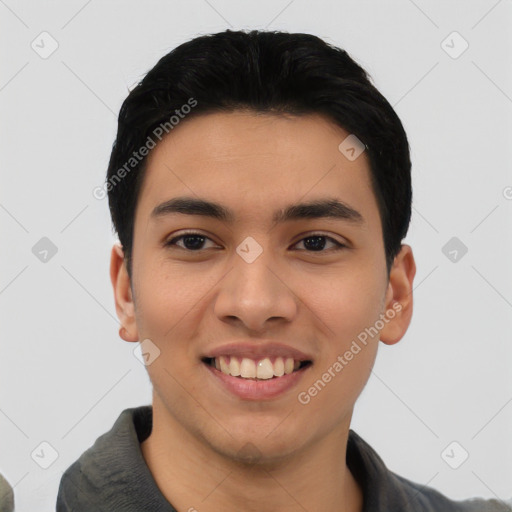 Joyful asian young-adult male with short  black hair and brown eyes