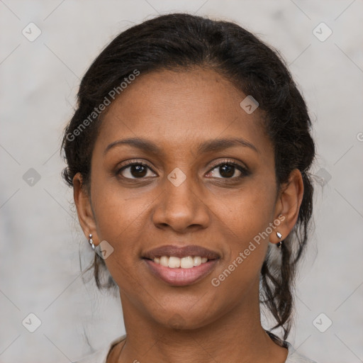 Joyful black young-adult female with medium  brown hair and brown eyes