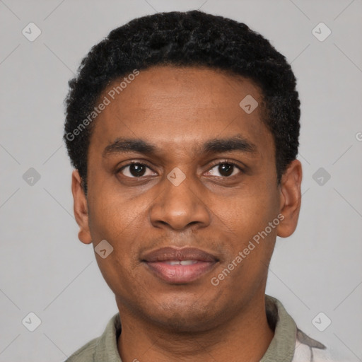 Joyful black young-adult male with short  black hair and brown eyes