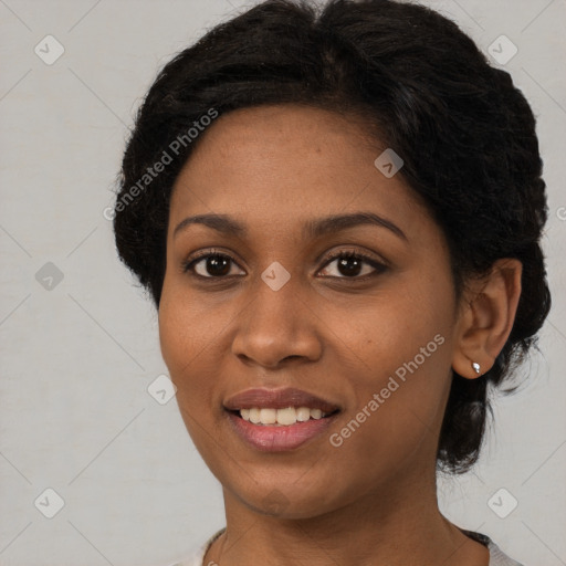 Joyful black young-adult female with medium  brown hair and brown eyes