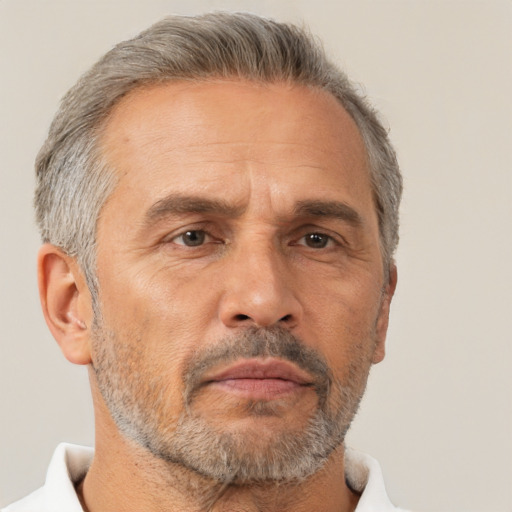 Neutral white middle-aged male with short  gray hair and brown eyes