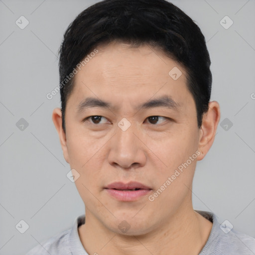 Neutral asian young-adult male with short  black hair and brown eyes