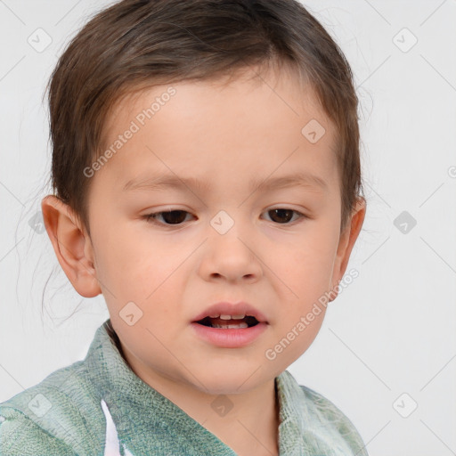 Joyful white child male with short  brown hair and brown eyes